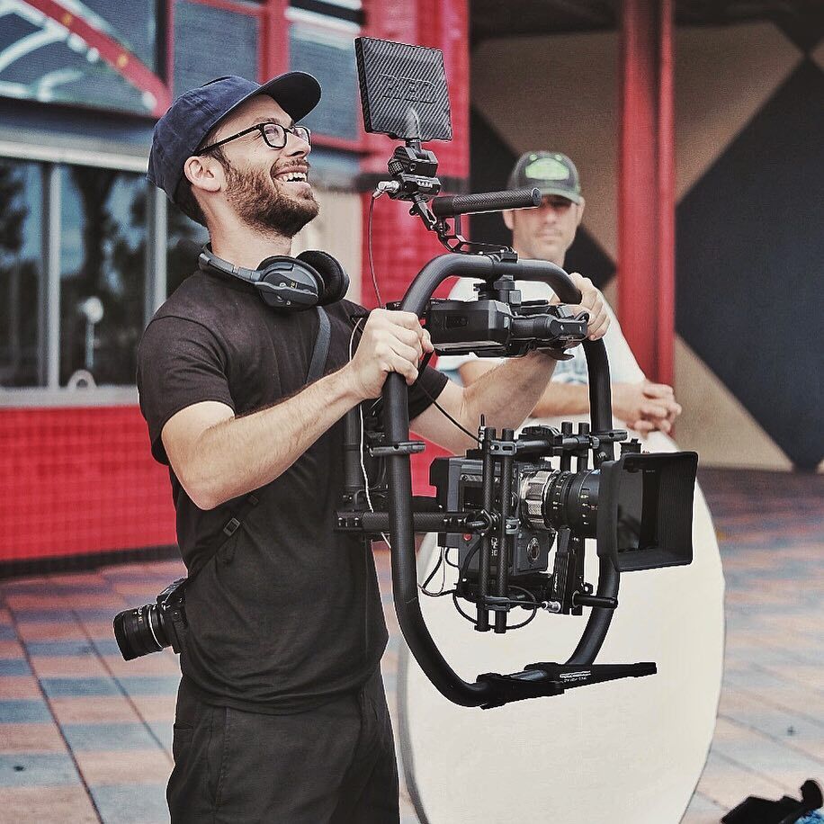 Adam operating the Movi with the Epic-W, grinning