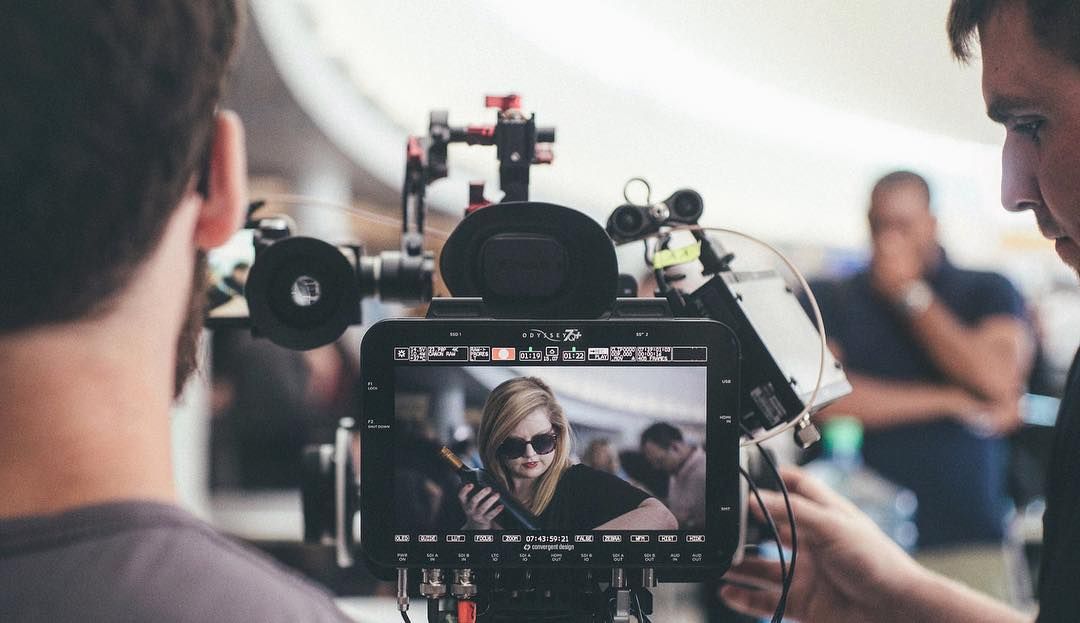 over-the-shoulder on the Odyssey 7Q monitor with talent on camera